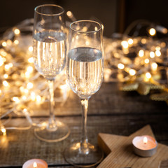Two glasses with wine. new year decorations