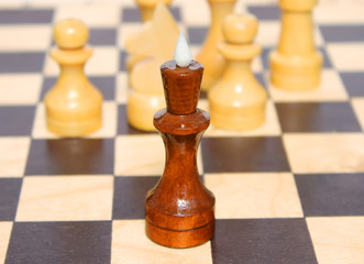 A lone black king