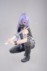 Female fantasy warrior / Female warrior with sword and gas mask isolated on the gray background