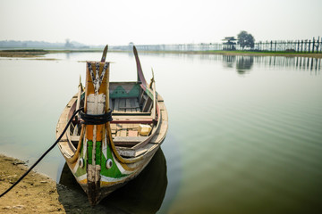 Fototapeta na wymiar Boat at U Bein Bridge