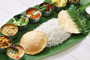 meals served on banana leaf, traditional south indian cuisine © uckyo