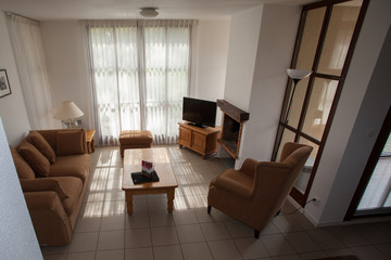 Modern, bright, clean, living room   in a  house