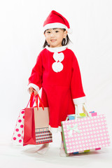 Asian Little Santa Claus with shopping bag