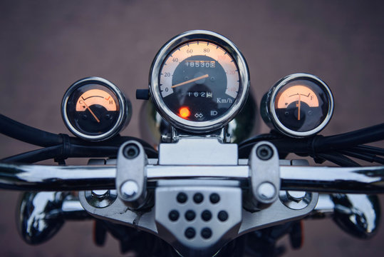 Fototapeta Dashboard with motorcycle speedometer from driver point of view