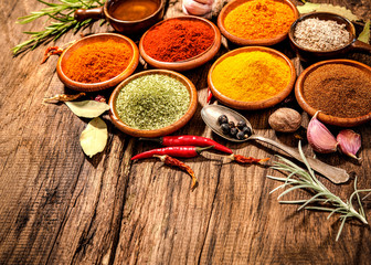 Herbs and spices on wooden table