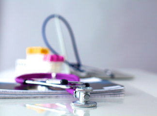 Medical preparations stethoscope  at the table