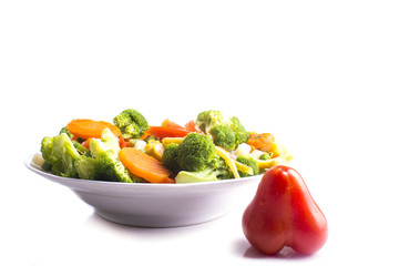 delicious salad of boiled vegetables useful tomato in a plate wi