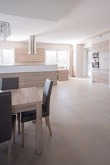 Wooden table and leather chairs