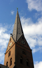 The tower of an old building with a clock