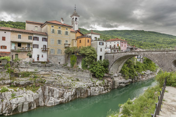 Fototapeta na wymiar Picturesque small town Kanal with famous bridge over the river Soca, Slovenia