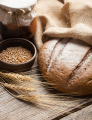 assortment of baked bread on wood table