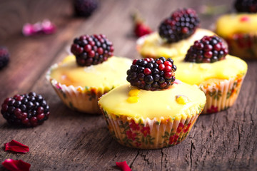 cupcake with blackberry and pudding