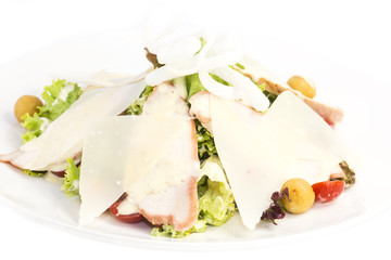 salad of meat cheese and vegetables in a restaurant