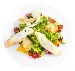 salad of meat cheese and vegetables in a restaurant