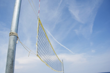 Beach volley net on a sandy beach