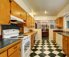 Classic American kitchen with checkered tile floor.