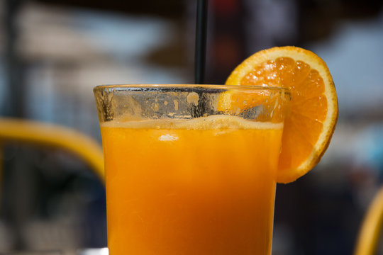 Glass full of fresh squized orange juice
