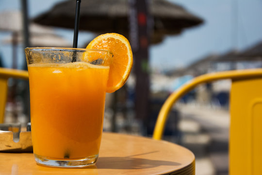 Glass full of fresh squized orange juice