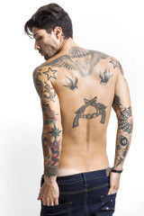 Fototapeta premium Handsome and sexy tattooed man back portrait