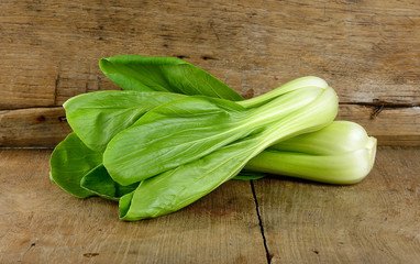 Bok choy vegetable on the wooden background