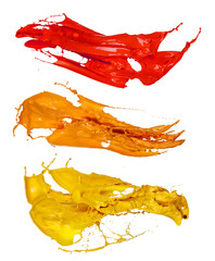 Colored paint splashes on white background