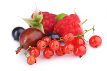Heap of fresh berries isolated on white