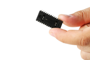 Male fingers holding microchip isolated on white