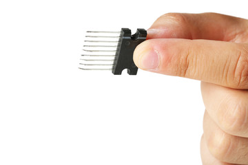 Male fingers holding microchip isolated on white