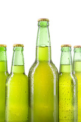 Cold bottles with dew and full of lager