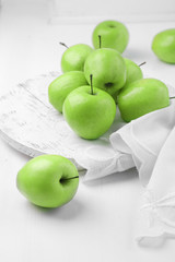 Green apples on windowsill, closeup