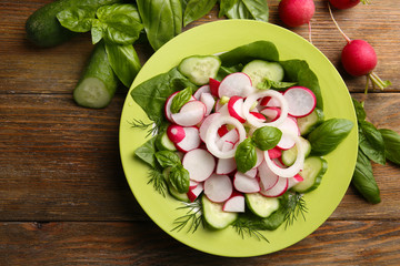 Fresh vegetable salad on table close up