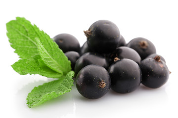Black currants isolated on white