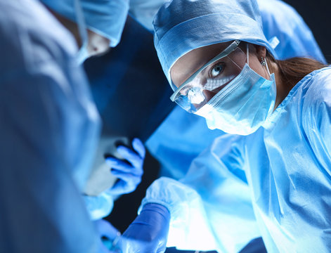 Team surgeon at work on operating in hospital