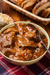 Beef stew served with crusty bread