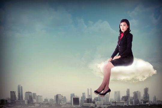 Woman Sitting On The Cloud