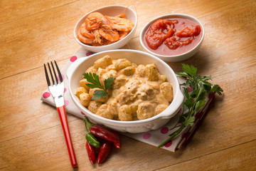 gnocchi with shrimp sauce and tomatoes