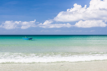 Fisher boat and clear turquoise water