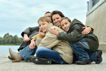 Family of four sitting