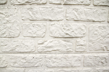 Wei&szlig;e Rustikale Backsteinwand