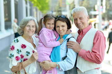 Family relaxing at city