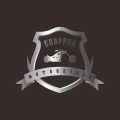 shiny silver shield chopper motorcycle