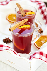 Mulled wine with spices and slice of orange