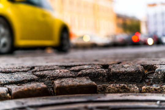 City Central Square Paved With Stone, Car Traveling On The Stree