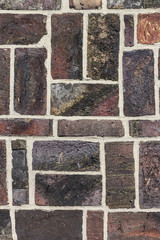 Brick wall with old fashioned clinker bricks
