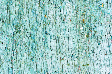 Wooden wall with cracked paint