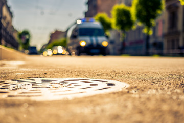 City on a sunny day, a quiet city street on which the van travel