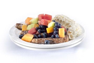 fresh fruit french toast and whipped cream