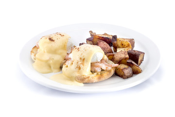 shrimp eggs benedict with hash browns