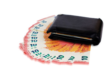 Black wallet lying on the ten euro notes