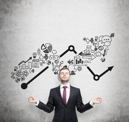 Meditative businessman and drawn a growing arrow on the concrete wall. Business icons as an...